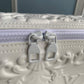 M21835 City Keepall Cross body bag white