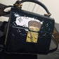 NZ1159 Monogram Vernis Spring Street Metallic crossbody bag Black