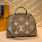 M41048 MONTAIGNE MM Monogram Empreinte 33cm brown