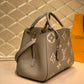 M41048 MONTAIGNE MM Monogram Empreinte 33cm brown