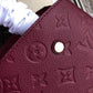 M41053 MONTAIGNE PM Monogram Empreinte 29cm maroon