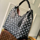 M53188 CARMEL Taurillon monogram 35cm black and white