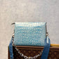 M57791 Coussin PM 26cm blue crocodile pattern