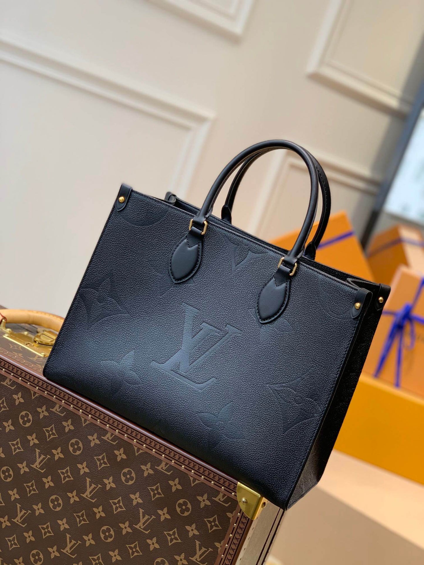 M45595 OnTheGo MM Monogram Empreinte leather black Giant Monogram