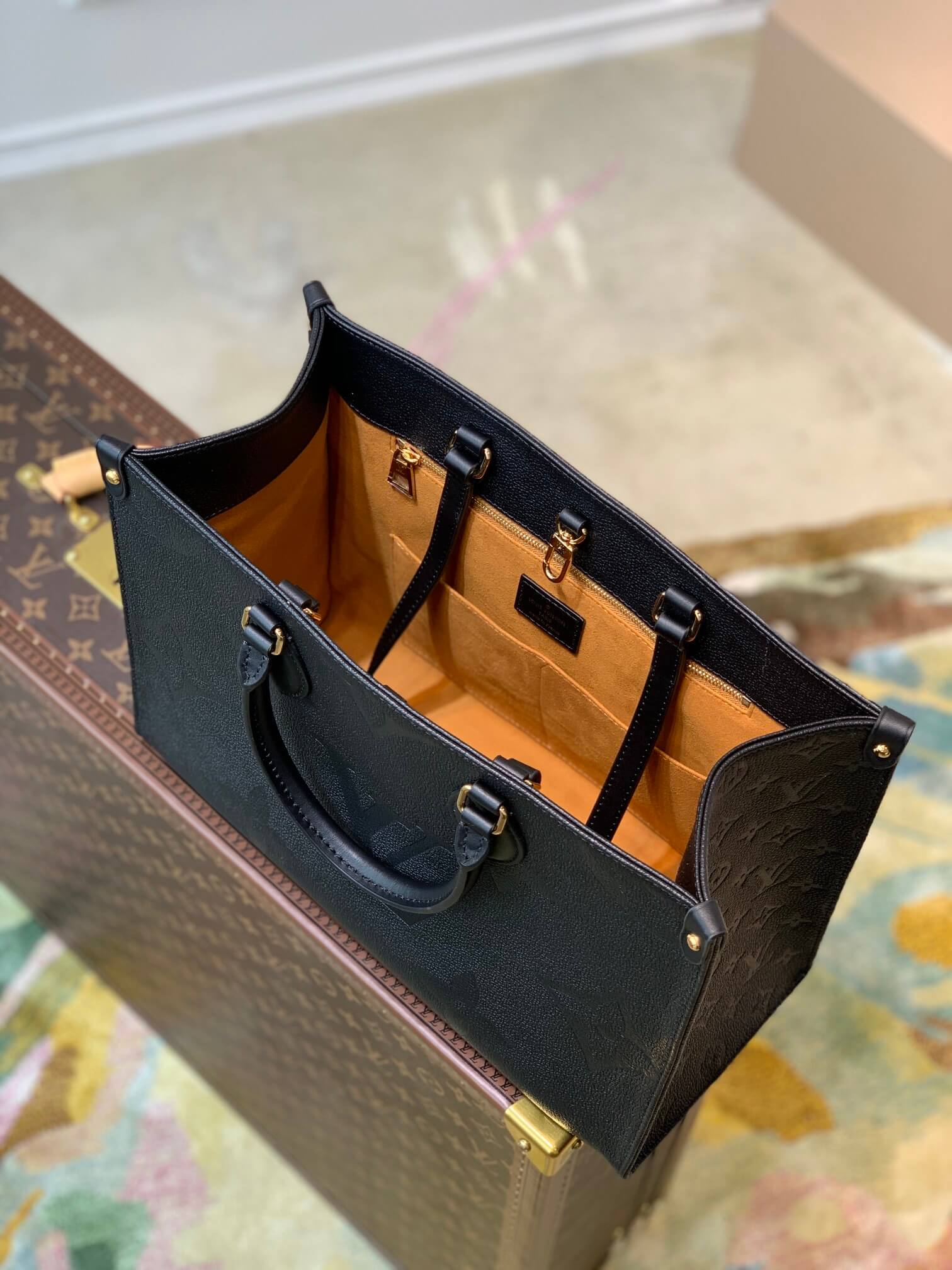 M45595 OnTheGo MM Monogram Empreinte leather black Giant Monogram