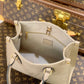 M45660 ONTHEGO PM tote bag Oversized monogrm empreinte leather Apricot