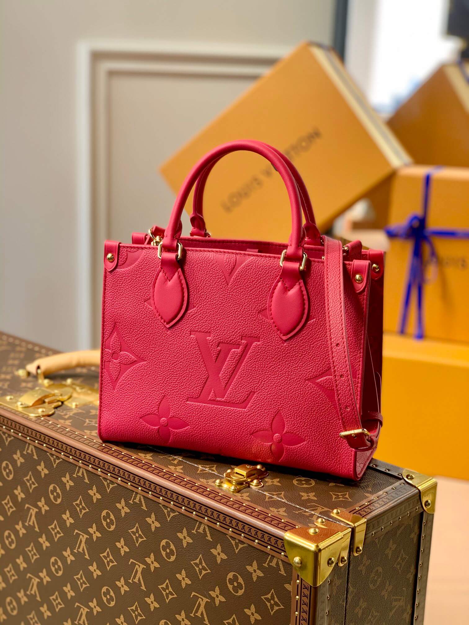 M45660 ONTHEGO PM tote bag Oversized monogrm empreinte leather Rose Red