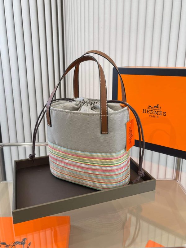 HERMÈS ROTTAN CANVAS WITH LEATHER BUCKET BAG 24CM