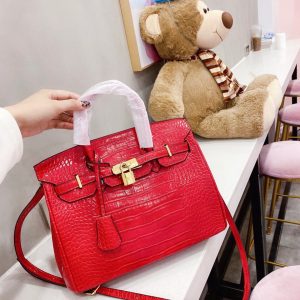 HERMES A SHINY SANGUINE POROSUS CROCODILE BIRKIN 30 WITH GOLD HARDWARE RED 30CM