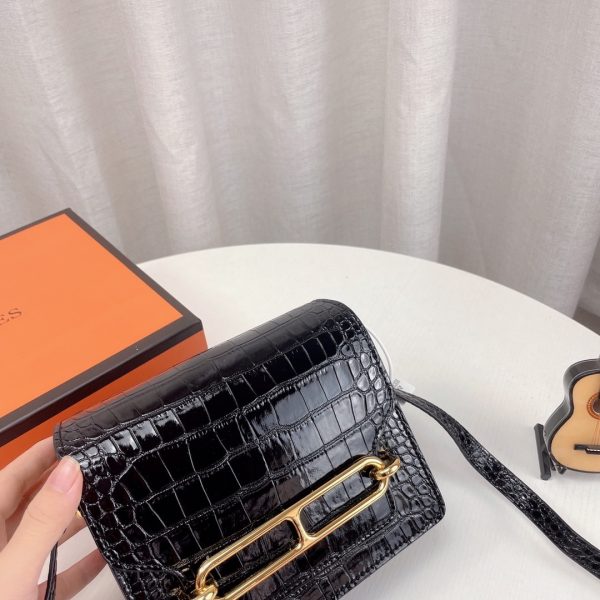 HERMÈS ROULIS BAG ALLIGATOR LEATHER GOLD HARDWARE IN BLACK 18CM