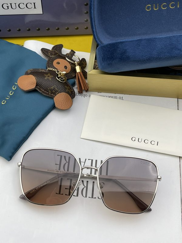 Gucci Silver Color Frame Black Lenses Sunglasses